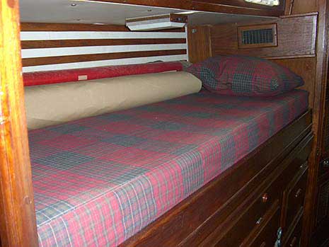 Forward Stateroom
• Double Birth
• Hanging locker
• Chest of drawers
• Seat
• Private in cabin head with shower, porcelain vacuflush toilet, porcelain sink and full length mirror
•  Access door to chain locker